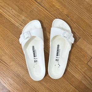 White Birkenstock Essentials single strap slides. Size 39.